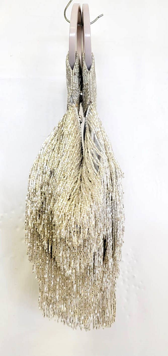 A BEADED BEST SELLER FRINGE WRISTLET ZIP TOP - EPOQUE