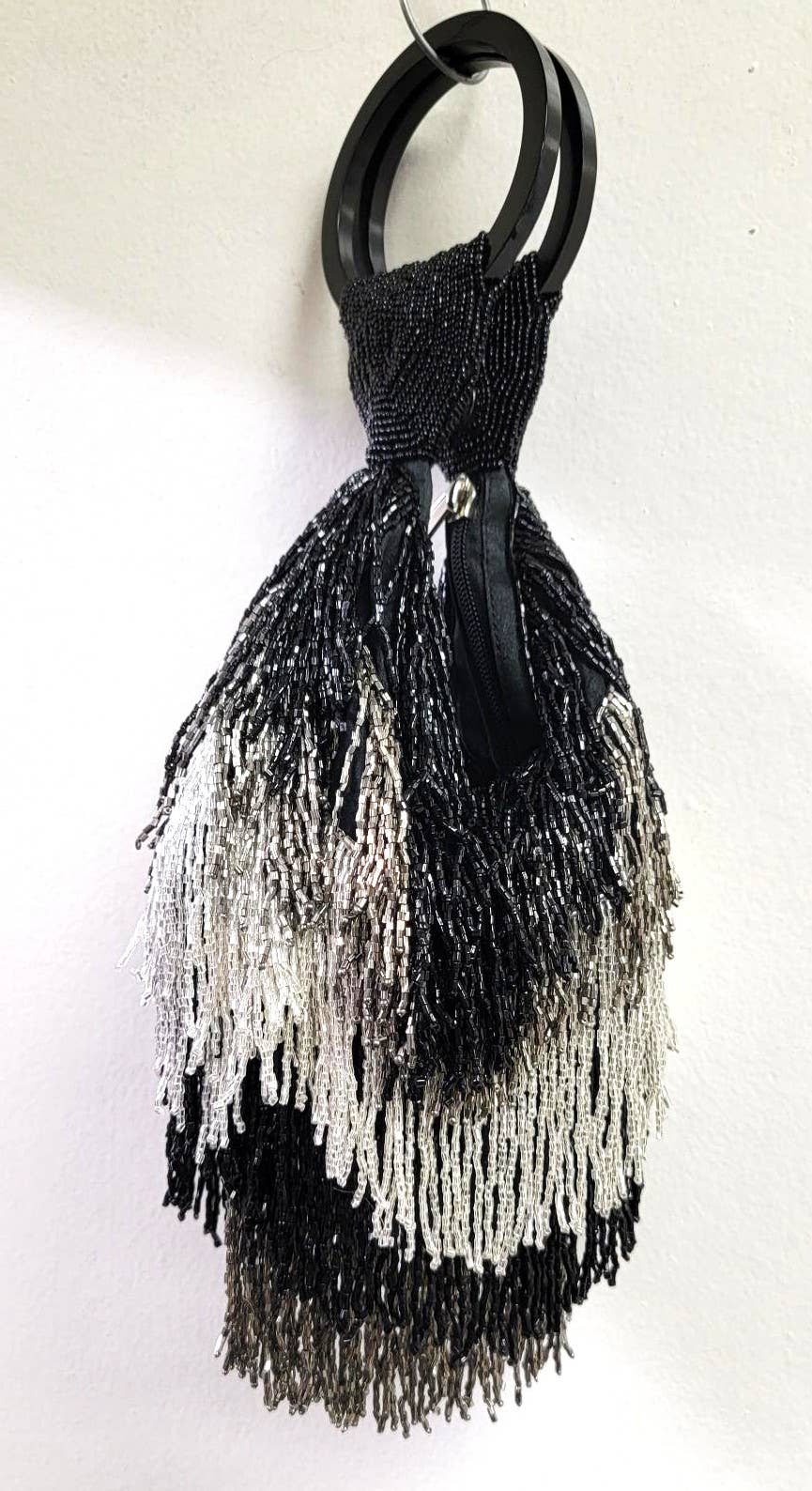 A BEADED BEST SELLER FRINGE WRISTLET ZIP TOP - EPOQUE