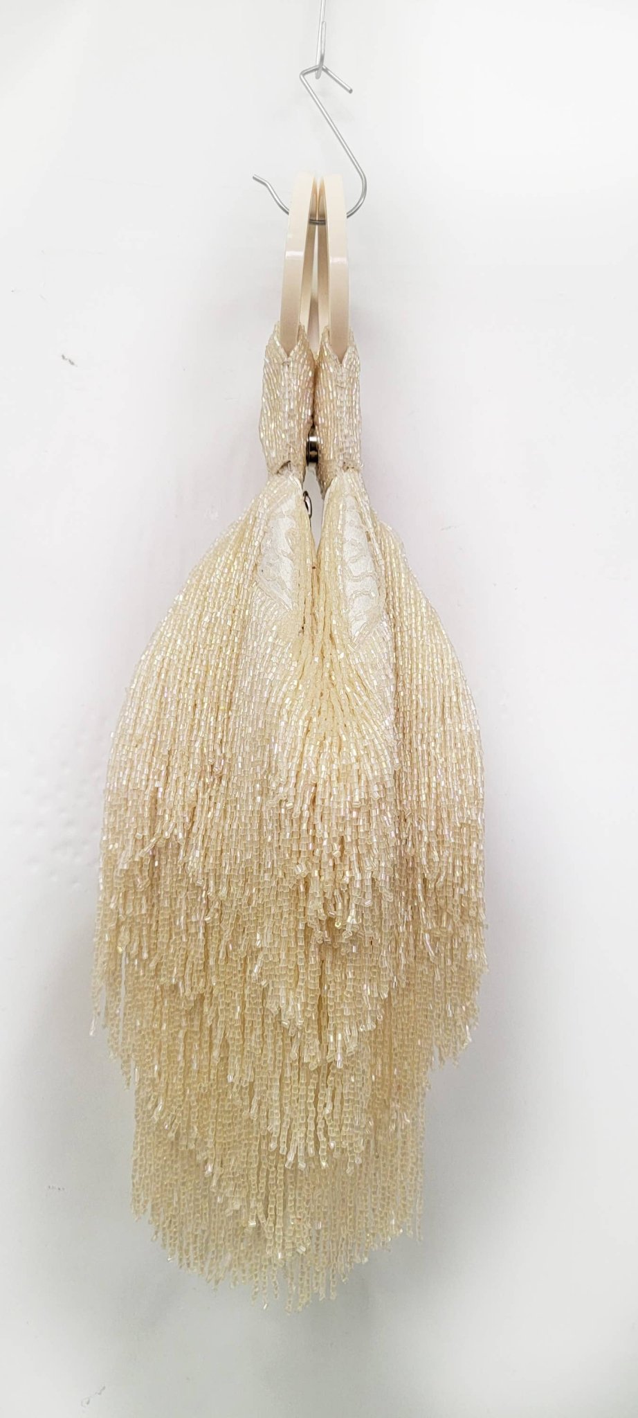 A BEADED BEST SELLER FRINGE WRISTLET ZIP TOP - EPOQUE