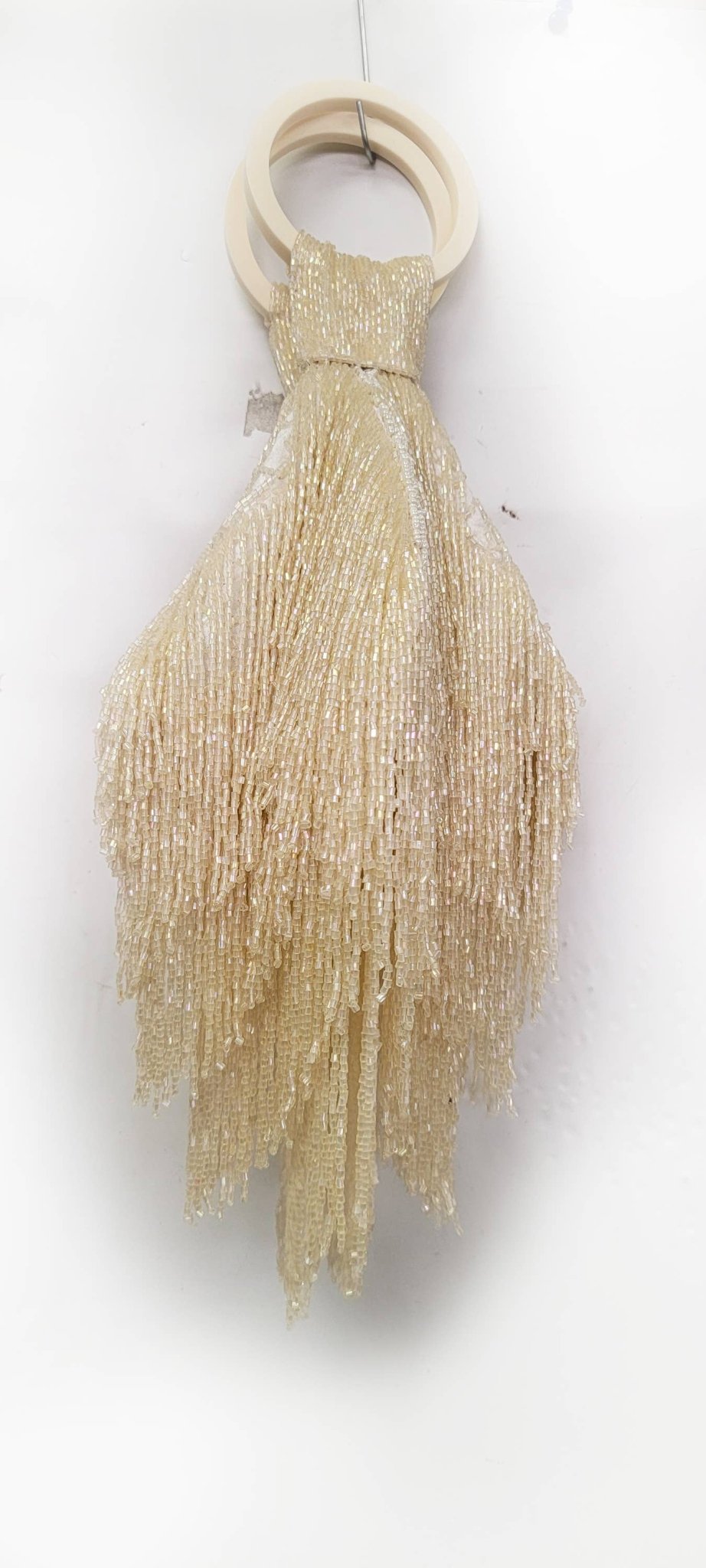 A BEADED BEST SELLER FRINGE WRISTLET ZIP TOP - EPOQUE
